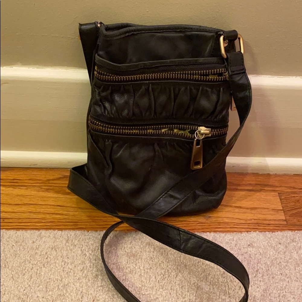 Black with gold leather bag, mild wear